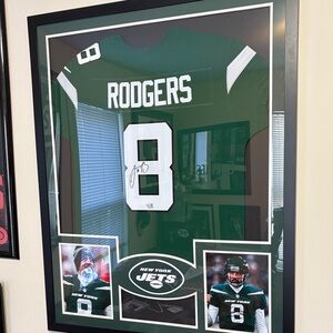 Autographed SB winner and MVP Aaron Rodgers framed.